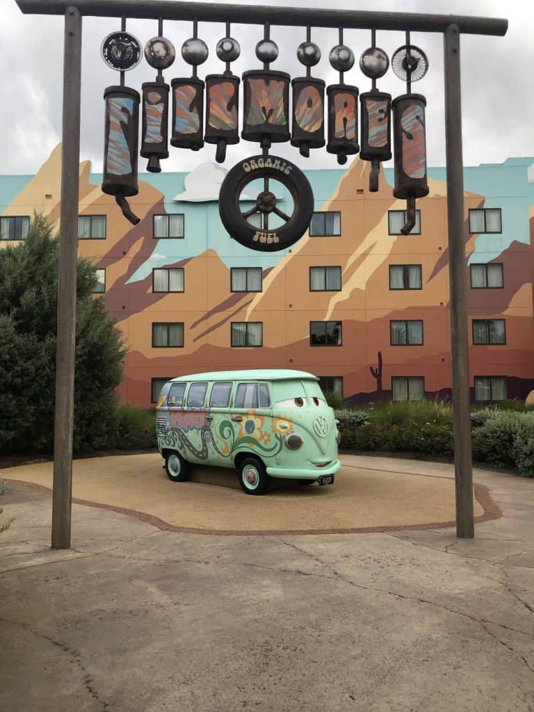 Art of Animation cars theming with a Cars character under a sign saying "Fillmores Organic Fuel".