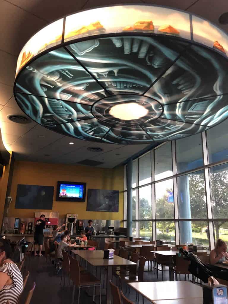 Art of Animation food court with tables
