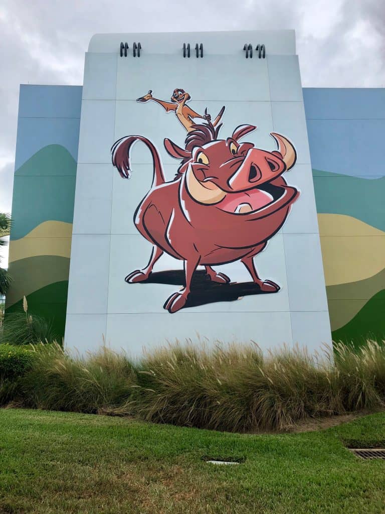 Art of Animation Lion King theming Timon and Pumba painted on a large wall