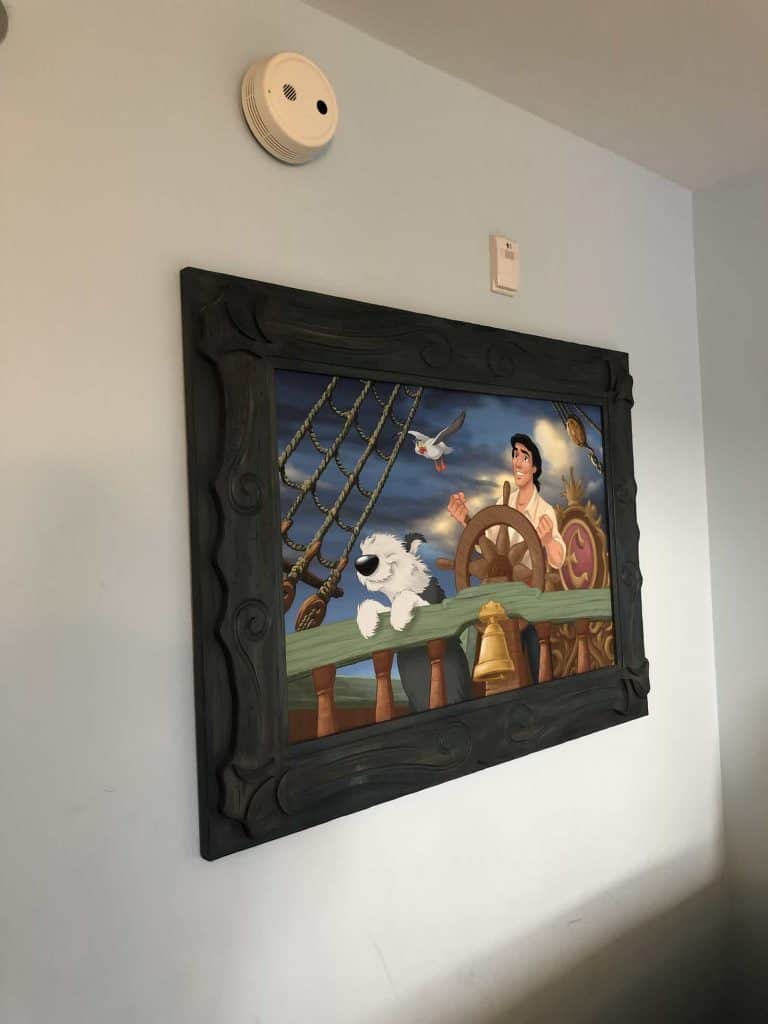 Wall picture inside the Art of Animation Little Mermaid standard room