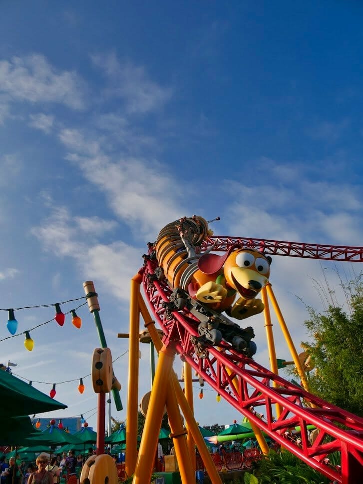 Slinky Dog Dash with the ride coming down the track towards camera with blue sky