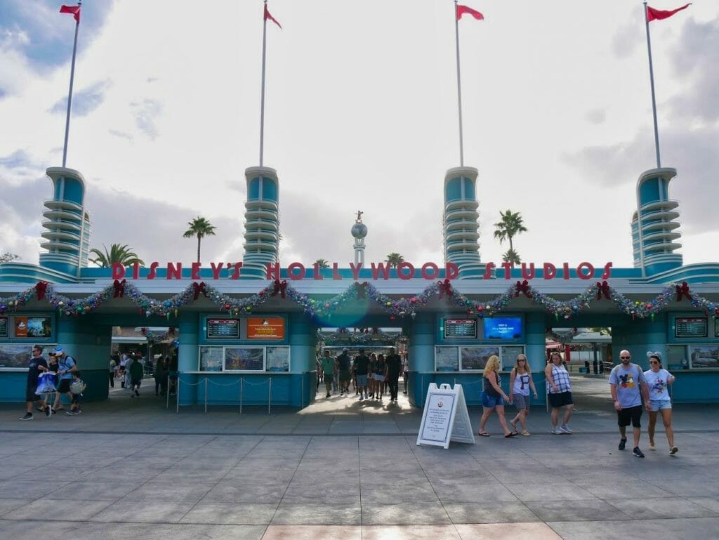 Hollywood Studios entrance with Christmas decorations on it