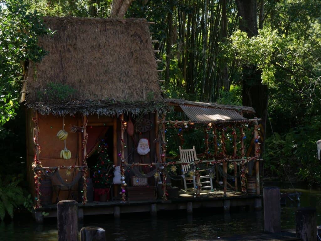 A hut decorated for Christmas on the Jungle Cruise at the Magic Kingdom in Disney World at Christmas