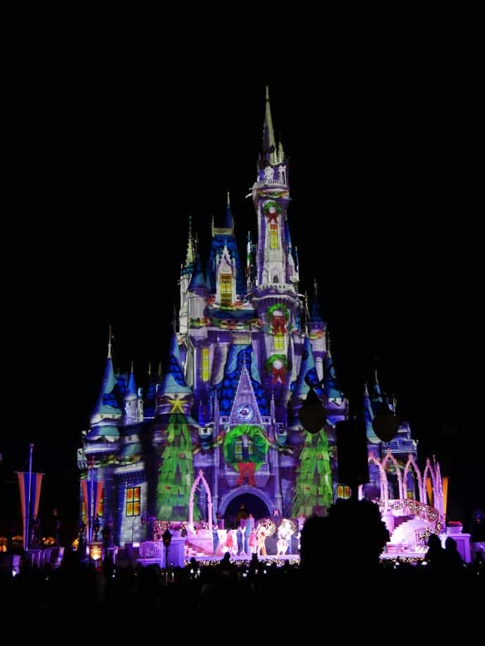 Castle lit up with Christmas Lights at the Magic Kingdom in Disney World at Christmas