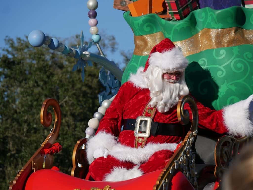 Santa Claus during the parade at the Magic Kingdom in Disney World at Christmas