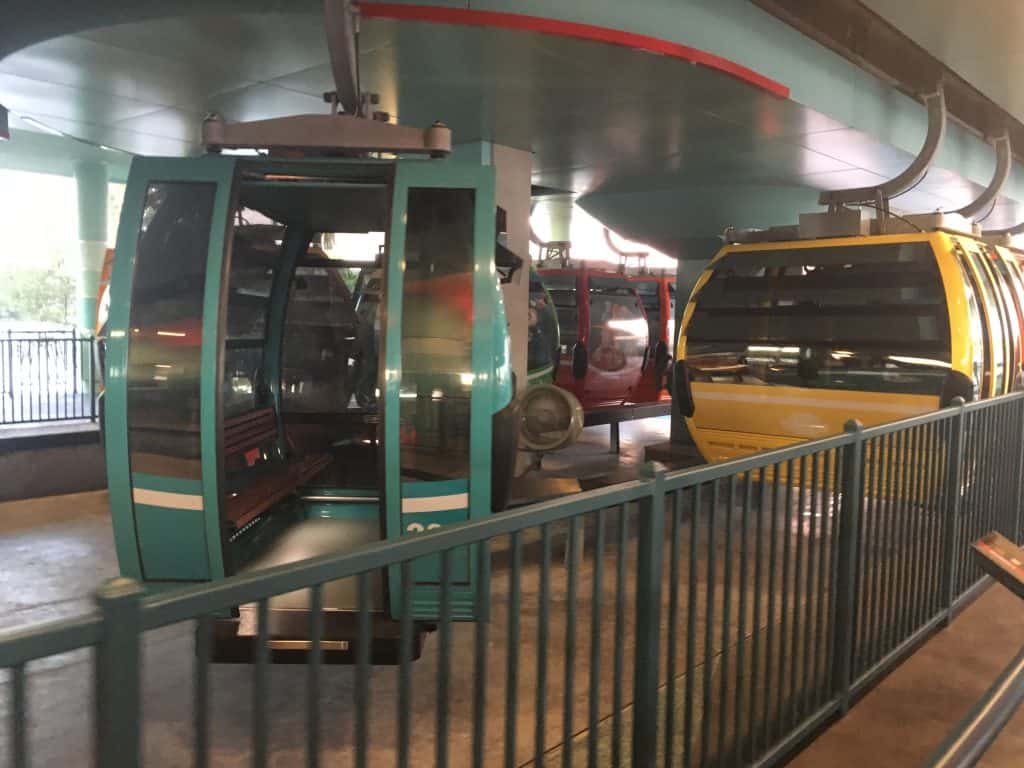 Disney Skyliner cars in a station
