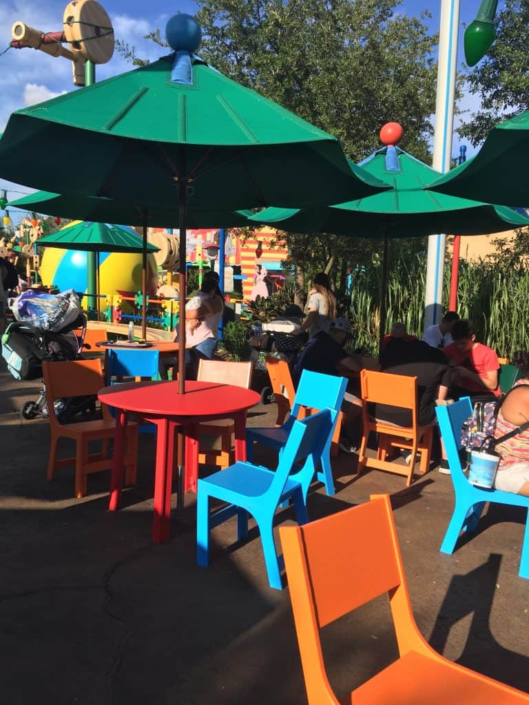 Seating at Woody's Lunchbox with bright colored tables and chairs