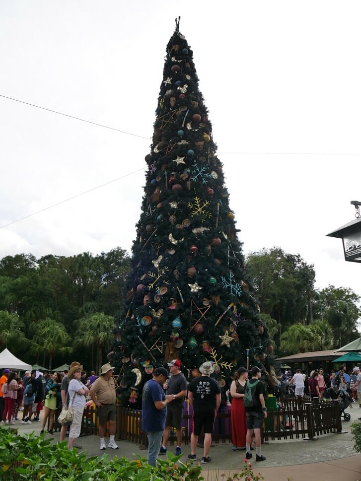 A large Christmas tree at the entrance of Animal Kingdom at Christmas