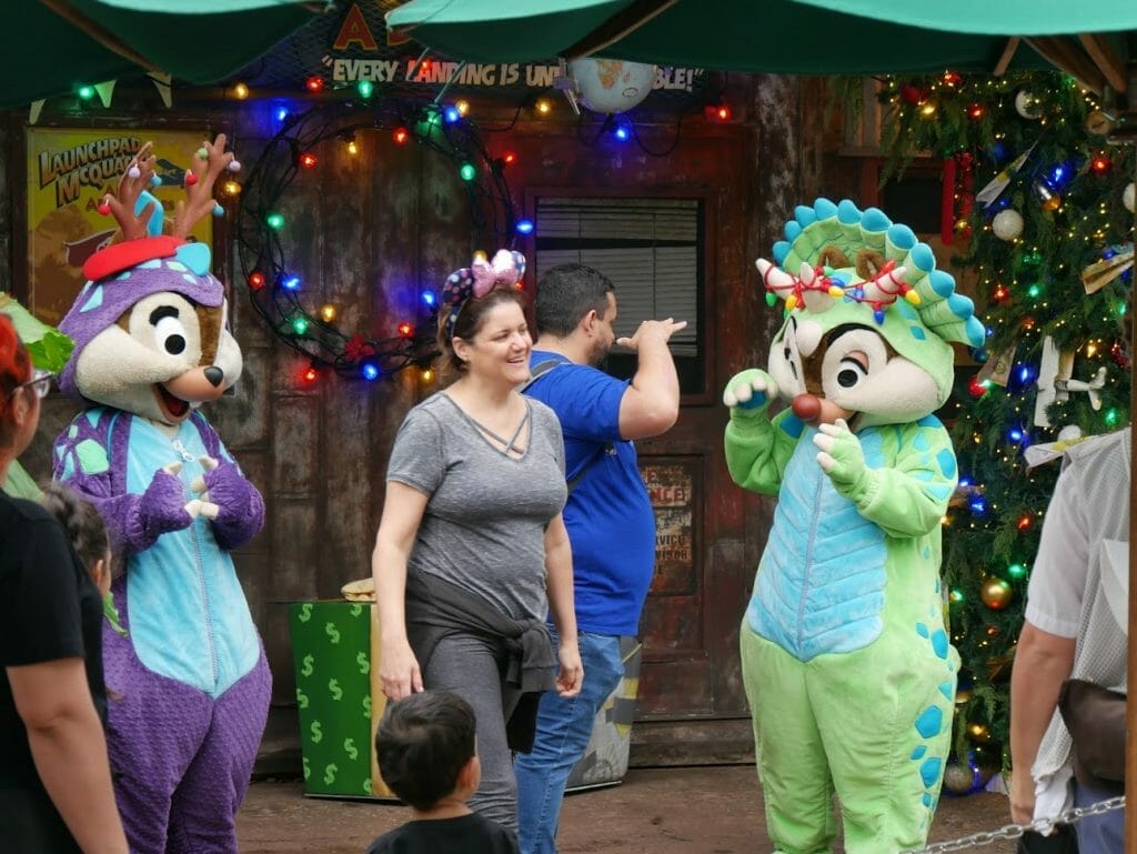 Chip and Dale with antlers on greeting a guest