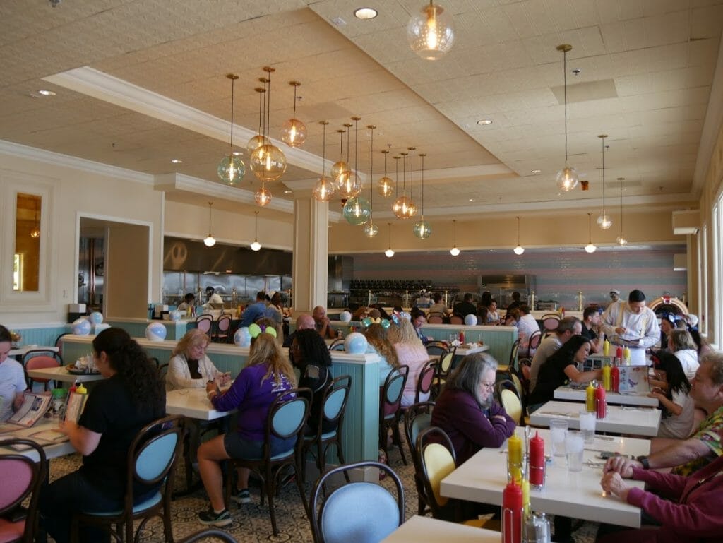 Interior of Beaches and Cream with people eating