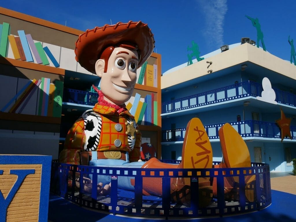 A giant Woody sitting down at Disney World All Star Movies resort Orlando
