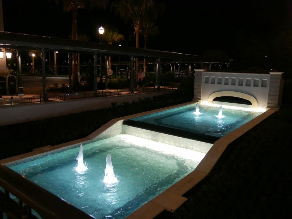 A water feature at night at Riviera Resort Disney World