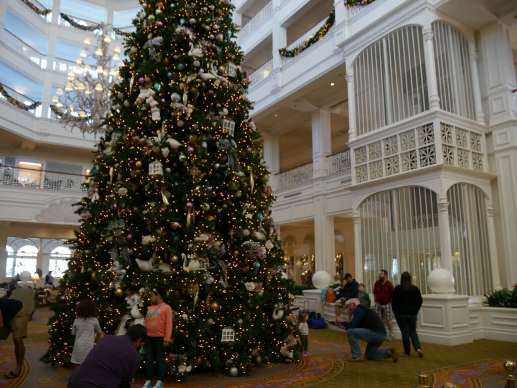 A large Christmas tree inside the Grand Floridian at Christmas at Disney World