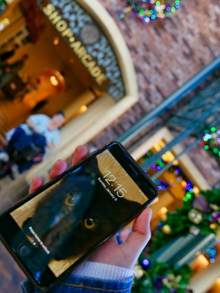 A phone with the time on during the Disney Resort Hopper Challenge