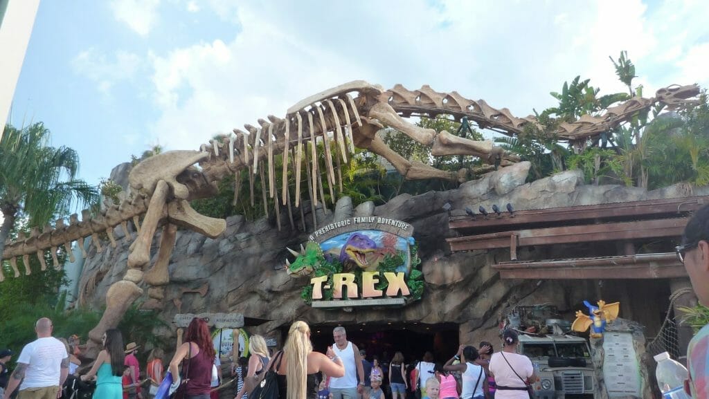 T-Rex entrance at Disney Springs with a large dinosaur skeleton above