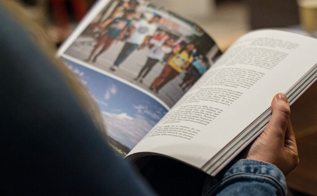 Close up of a person holding a book