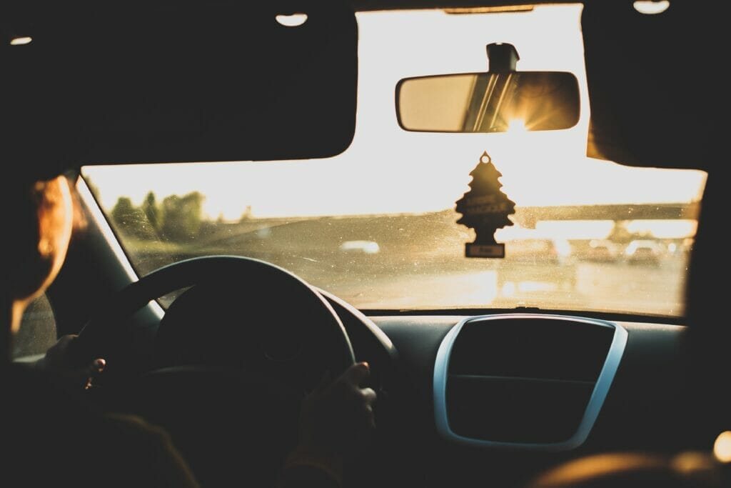 Bright sunlight through a car's front windshield