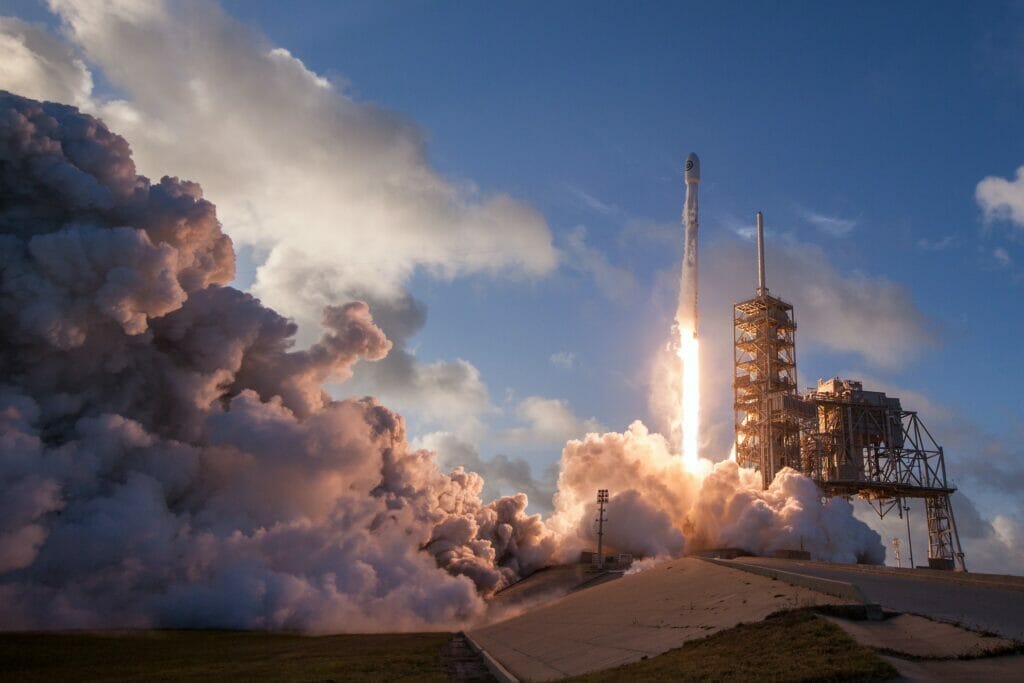 rocket blasting off at kennedy space center