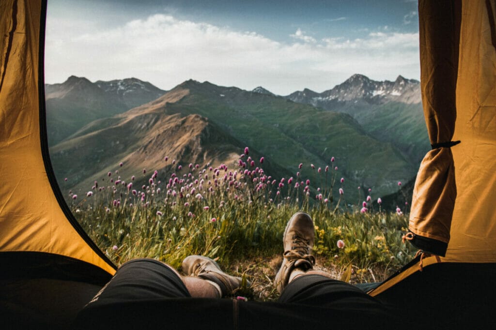 feet sticking out of a tent