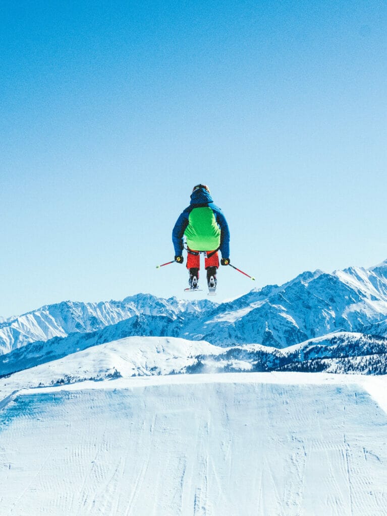 man skiing from behind