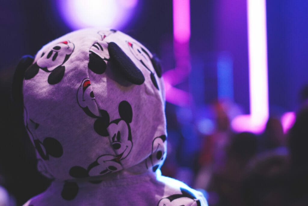 child with mickey hoodie facing away