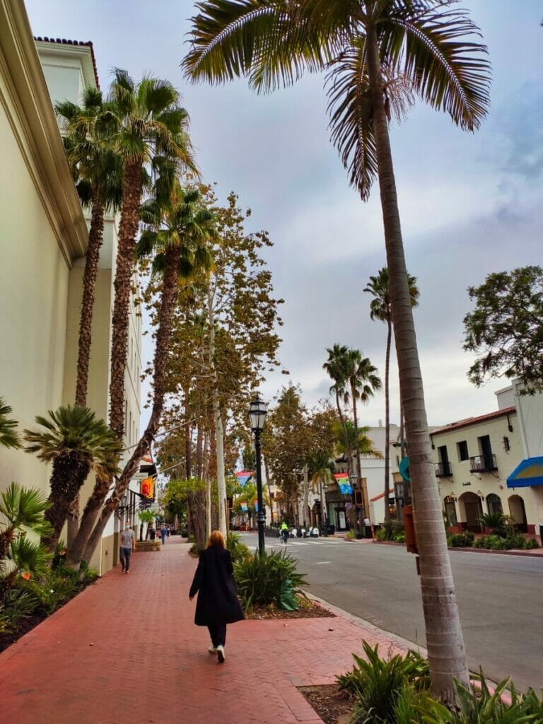 woman walking down street in santa barbara