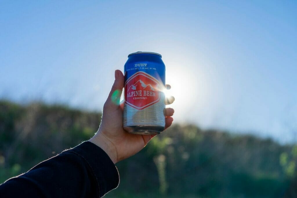 Image of a man holding a beer