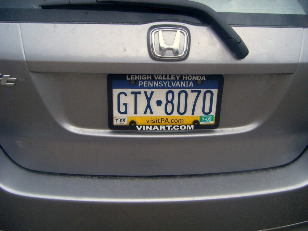 Image of a PA license plate with a website on it