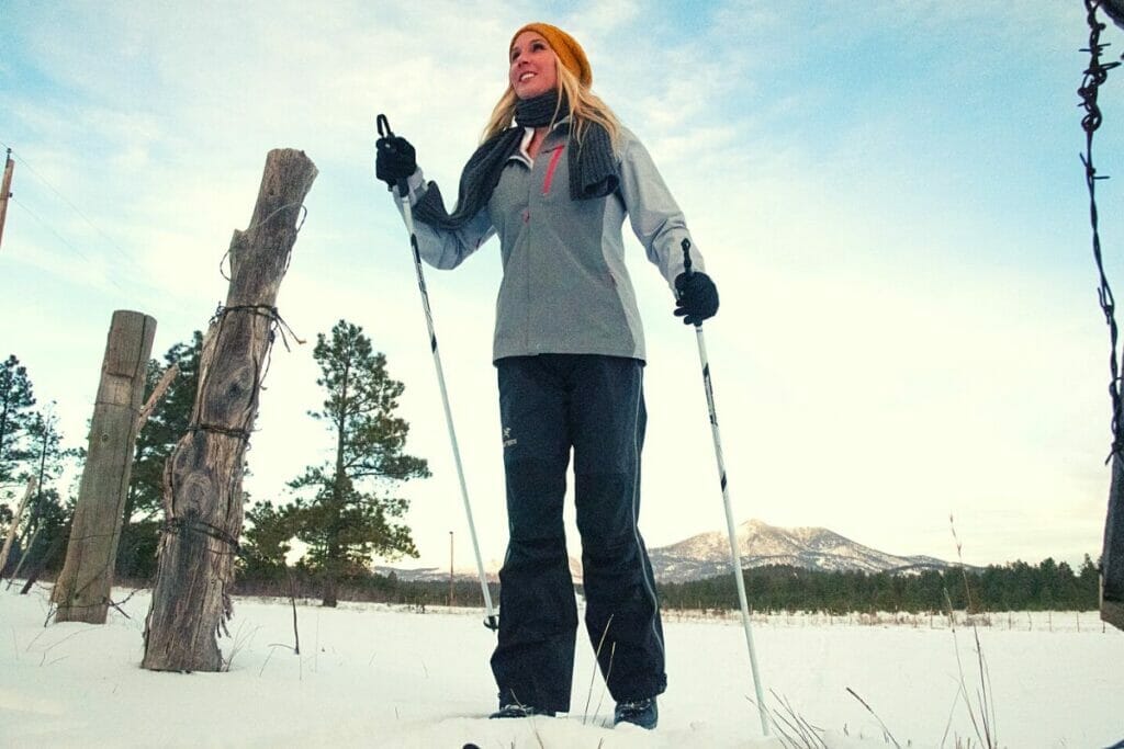 Blonde woman skiing 