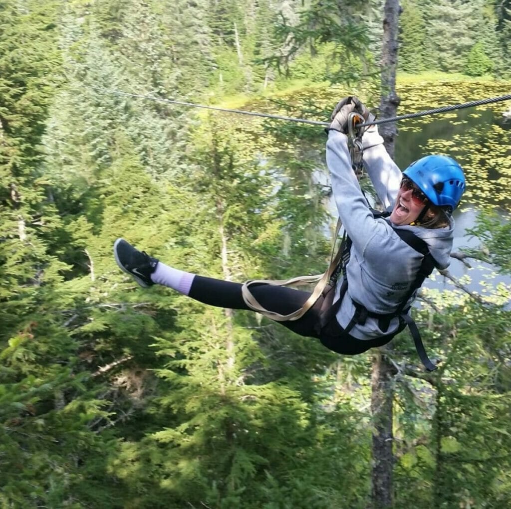 Woman ziplining