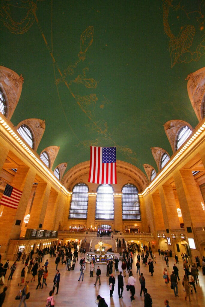 People walking around Grand Central Station 