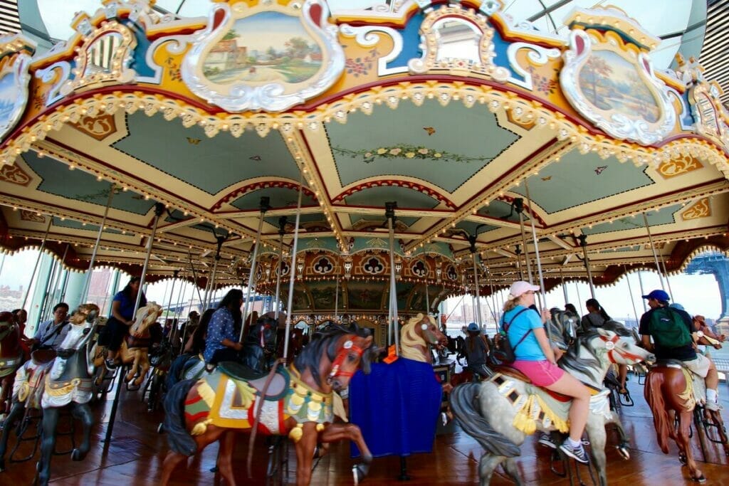 People riding on Jane's Carousel 