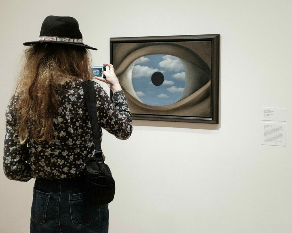 Woman looking at art in MoMA