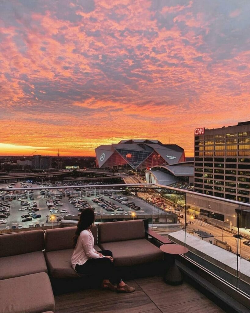 Girl sitting at the Sky Lounge bar 