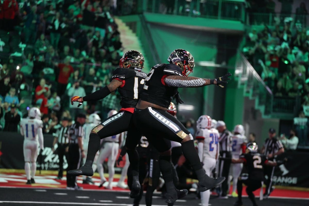 Two players colliding during indoor football at The Dollar Loan Center in Henderson Nevada