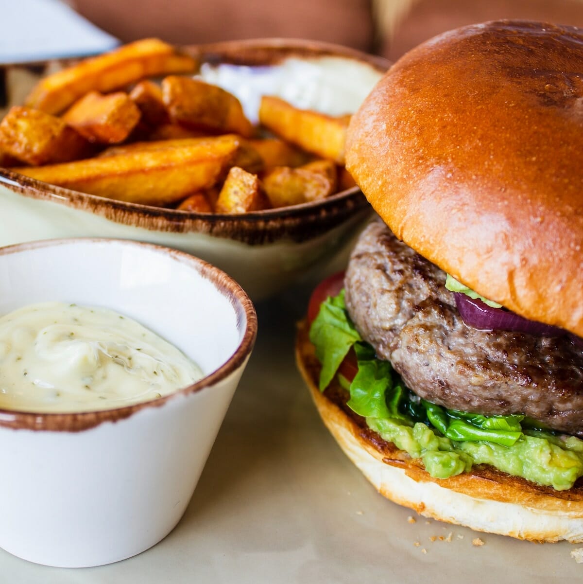 Burger and fries, something you might find on a food tour in Orlando