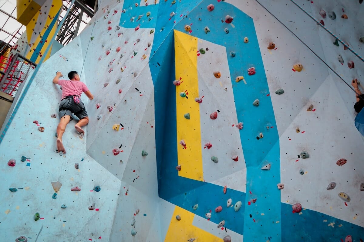 A tall rock climbing wall, one of the most fun things to do in Orlando for adults