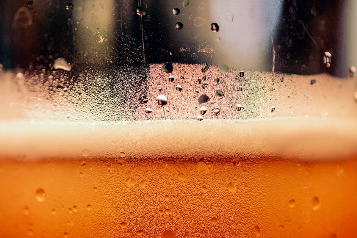 Close-up of beer with condensation on the glass.