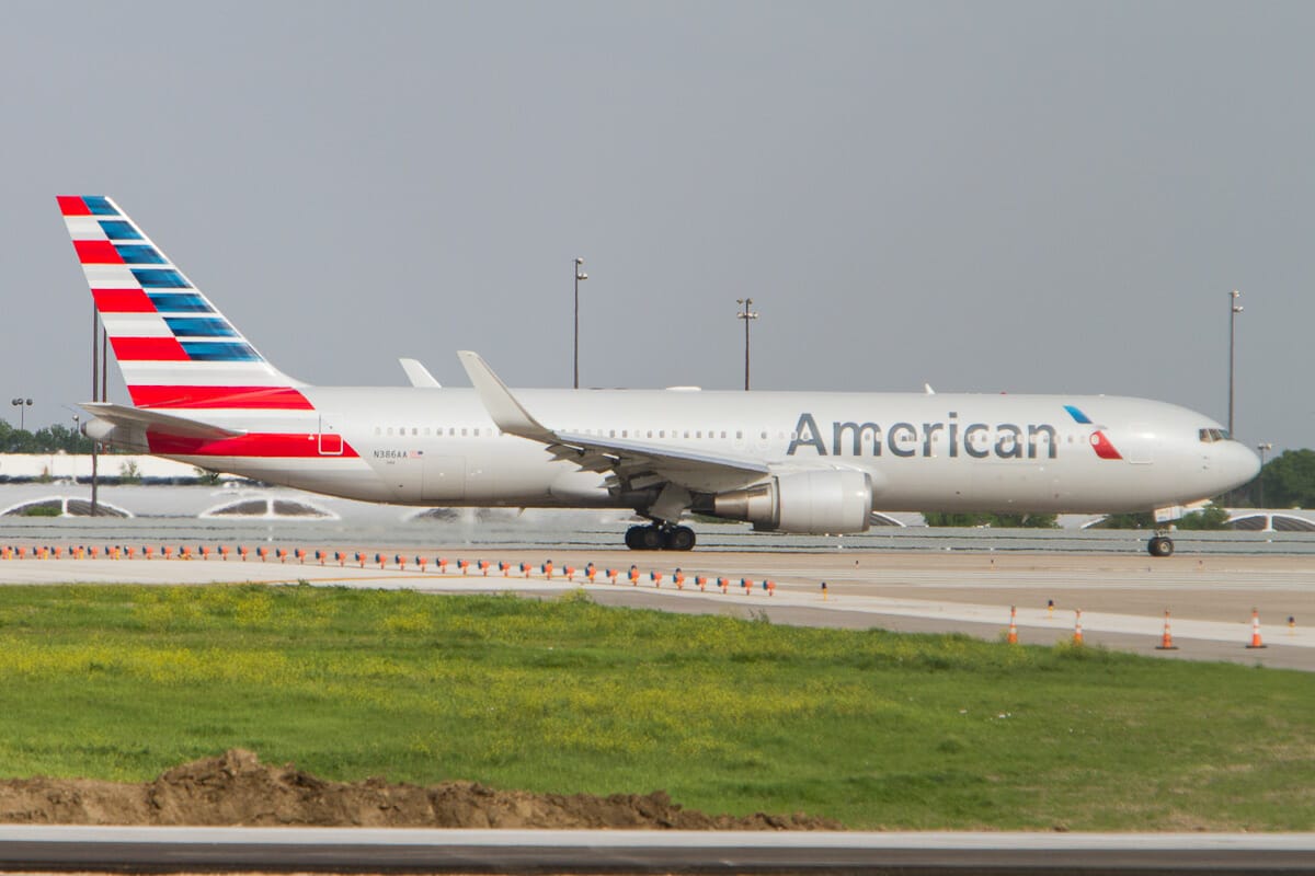 An American Airlines Boeing airplane seen from the Founders' Observation Area at DFW