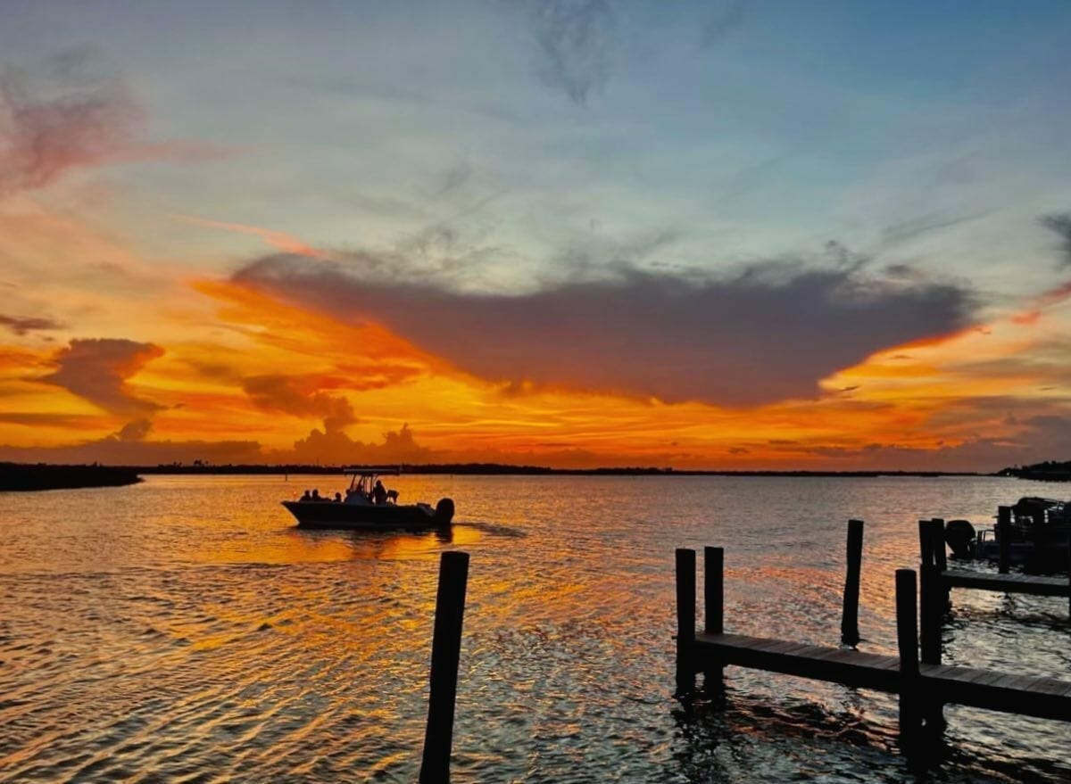 Sunset over the waters as seen from the docks at Mary McLeod Bethune Beach Park in New Smyrna Beach, Florida