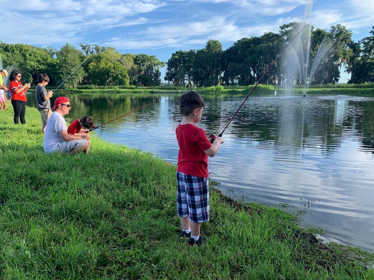 families fishing at Central Winds Park in Winter Springs