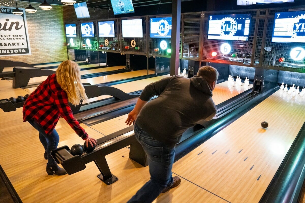 two people play duckpin at Skyline Social and Games Duluth Minnesota