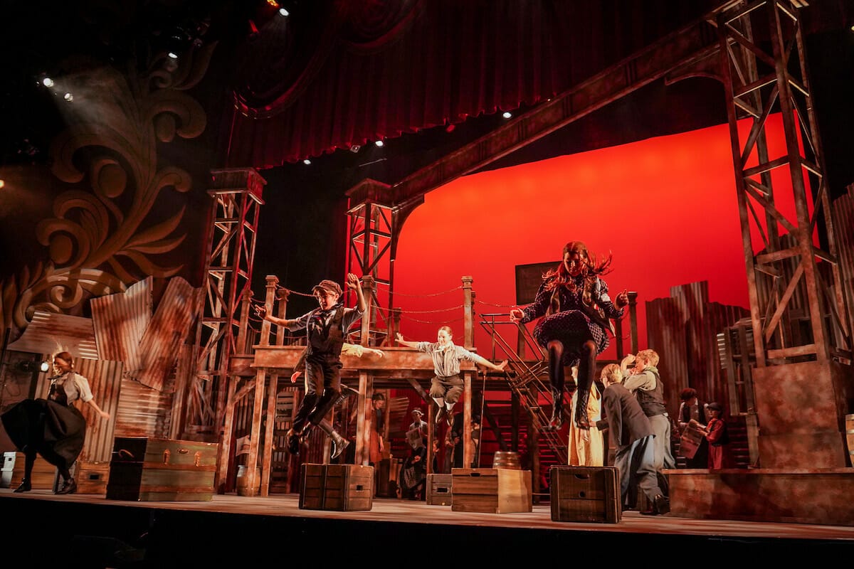 performers dance during a youth performance of Newsies at Duluth Playhouse