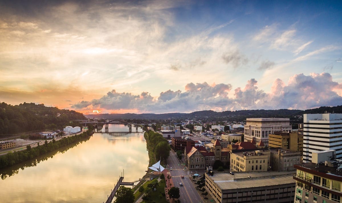 colorful view of the Kanawha River waterfront in Charleston West Virginia at sunset