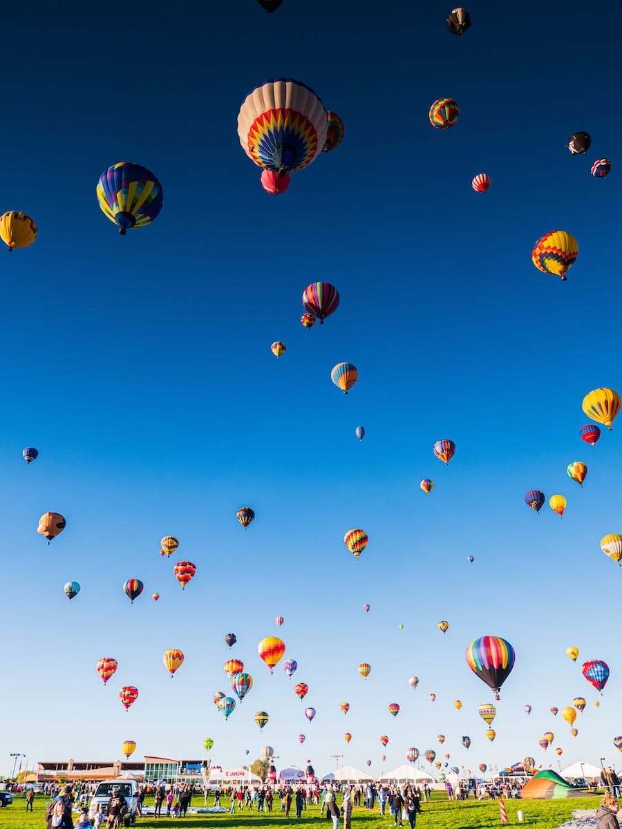 colorful hot air balloons fill the skies in Albuquerque New Mexico, one of the most beautiful places in America