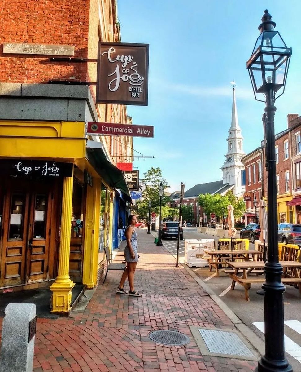 historic buildings line brick sidewalks in downtown Portsmouth New Hampshire