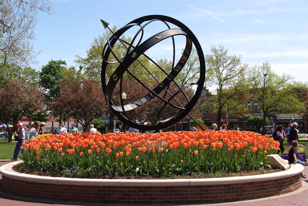 sculpture surrounded by tulips during Tulip Time in Pella Iowa